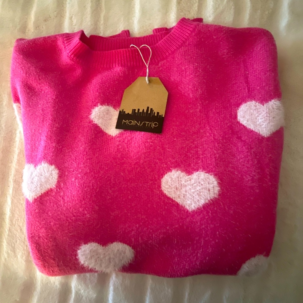 Pink Valentine sweater. 100% acrylic.